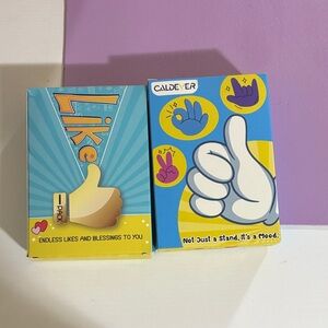 2 Thumbs Up Phone Stand - never used